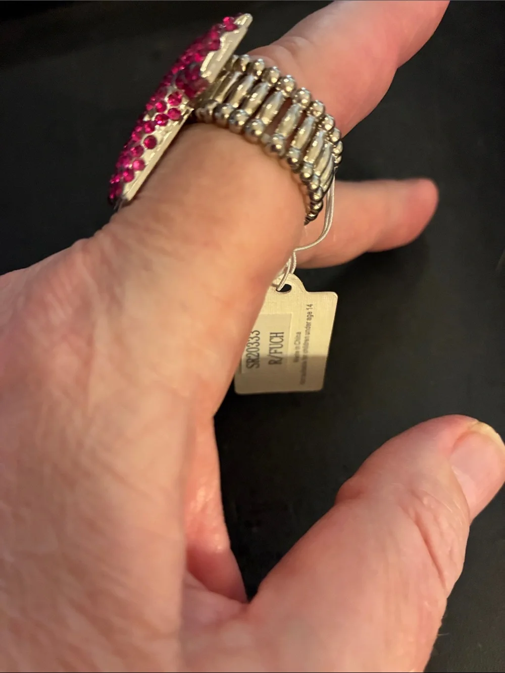 Pink Cross Statement Stretch Ring. Pink crystals encrust this cross ring. NWT